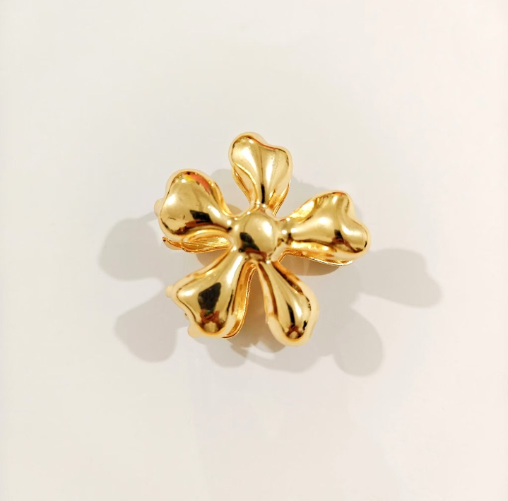 Norma's golden flower clips